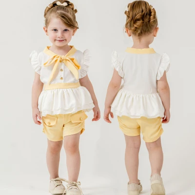 9/24 AY BAGLAMALI BLUZLU SORTLU KIZ TAKIM